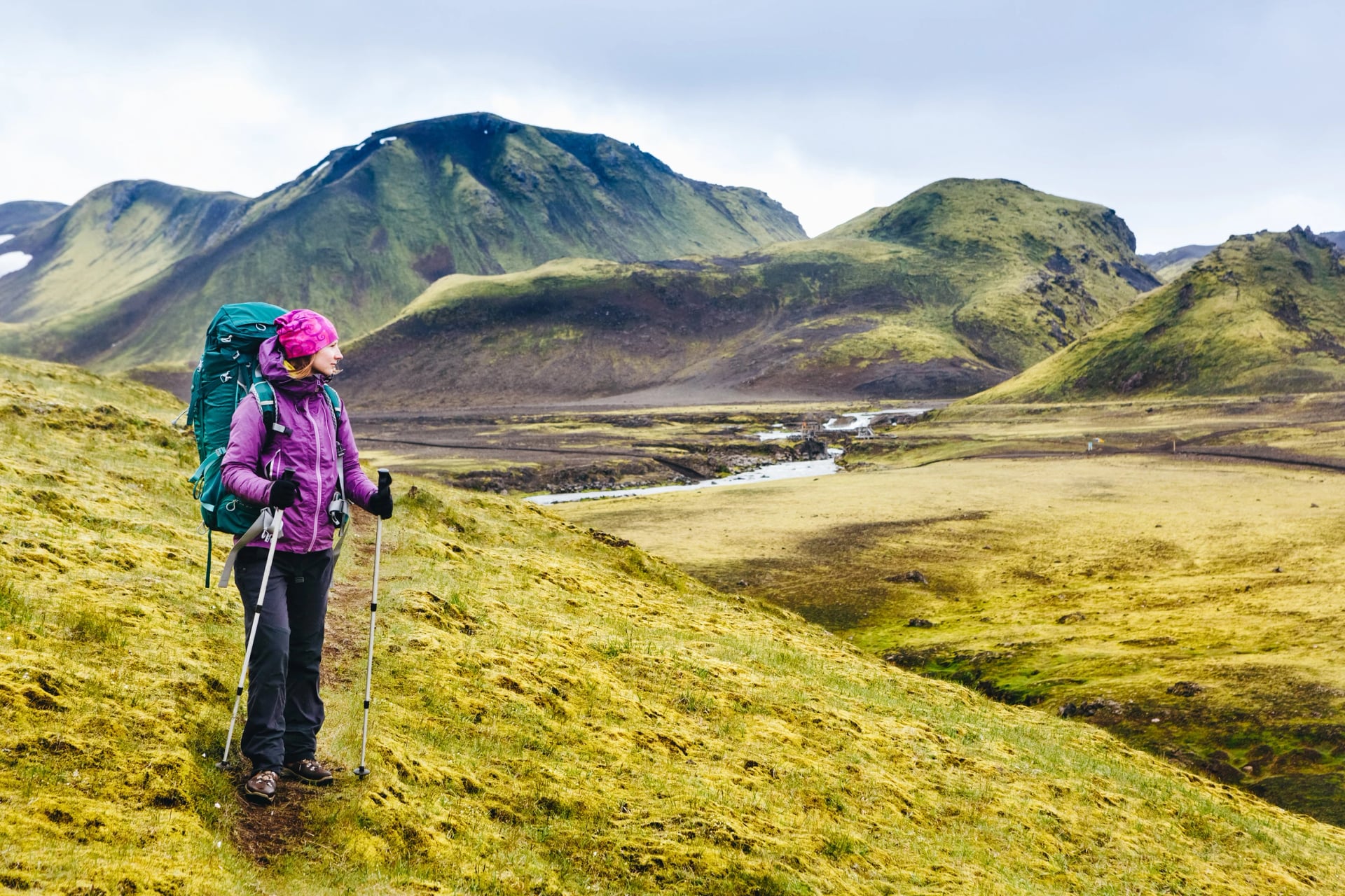 Active hiker enjoying the view on the trail in Landmannalaugar, Iceland