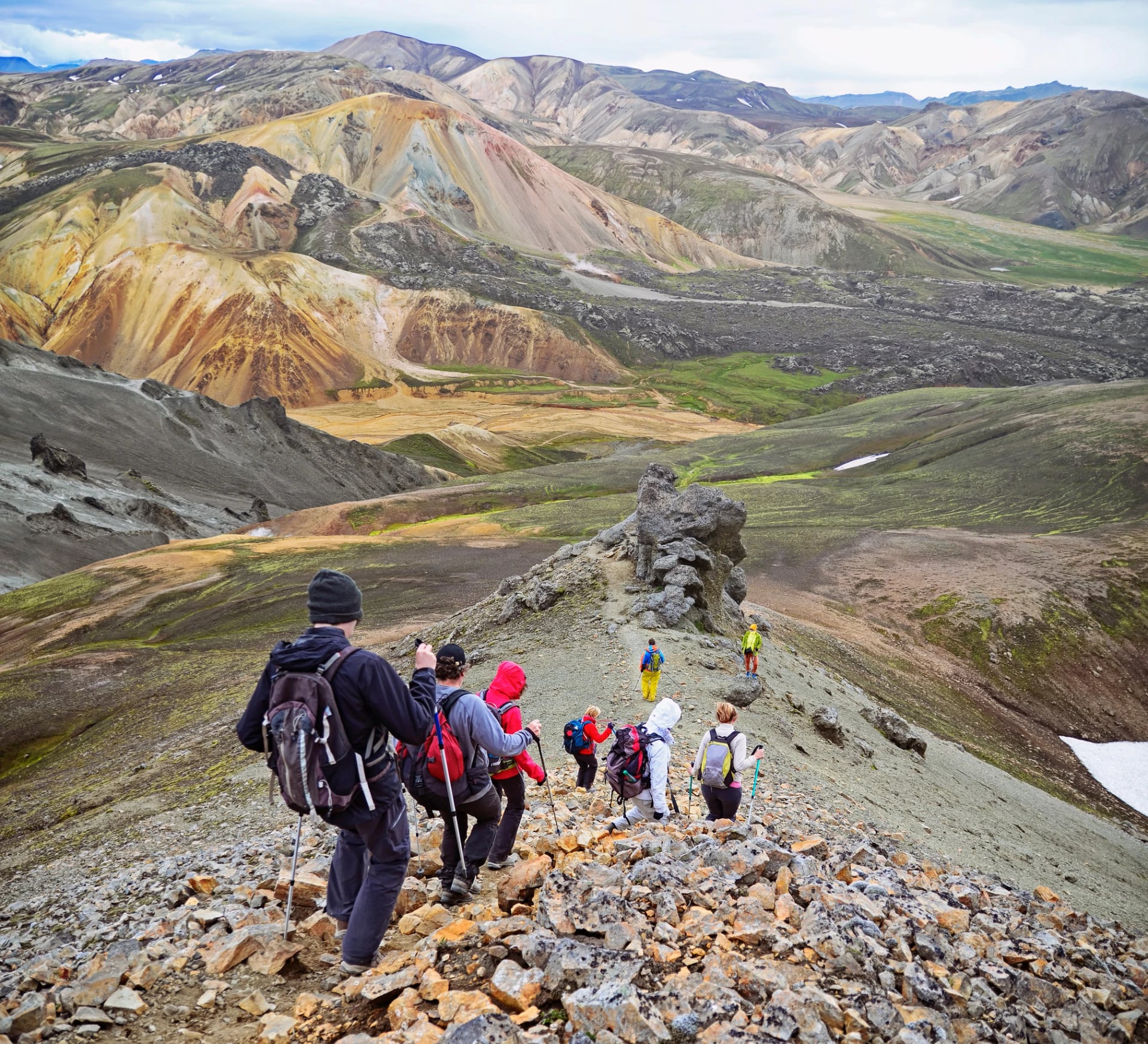 Group of hikers in the mountains . Icelandic landscape - view